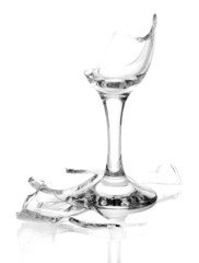 Broken wineglass isolated on white