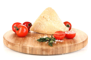 Piece of Parmesan cheese on wooden board isolated on white