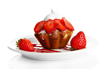 Tasty muffin cake with strawberries and chocolate