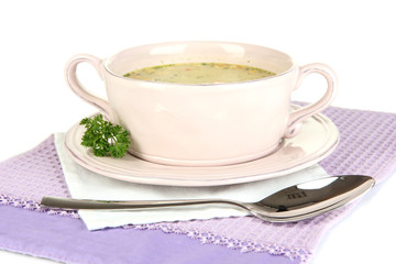 Nourishing soup with vegetables in pan isolated on white