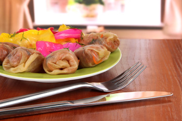 Stuffed cabbage rolls on table at home