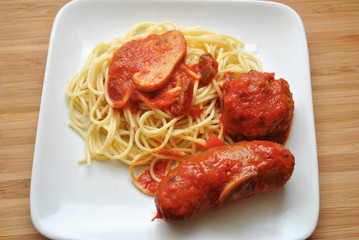 Mushroom Tomato Sauce over Spaghetti and Italian Meats