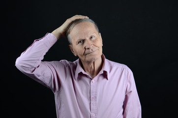 happy man holding his hand on head