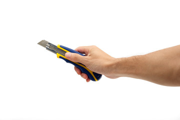 Hand holding a box cutter