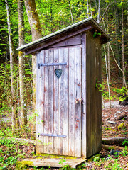 old wooden outhouse