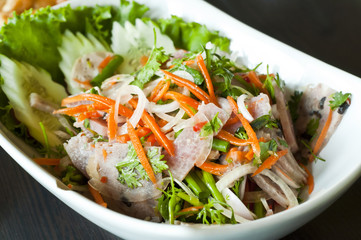 Thai style spicy sour pork salad.