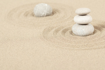 Fototapeta na wymiar Balance zen stones in sand