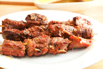 thai grilled pork with short ribs on plate