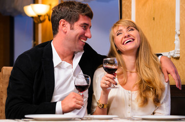 couple is sitting at restaurant