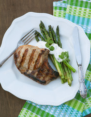 Grilled pork chops with grilled asparagus