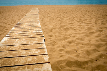 Wooden path to the sea