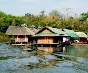 Fototapeta na wymiar Thailand, houses on the water, bungalow, river