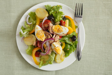 Salad nicoise. Tuna, eggs, potatoes, green beans, tomatoes