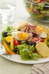 Salad nicoise. Tuna, eggs, potatoes, green beans, tomatoes