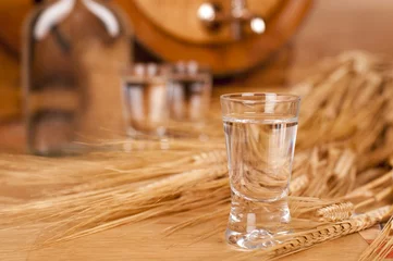 Foto op Plexiglas glass of vodka and barrel © ded