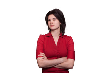 Young woman in a red shirt with arms folded