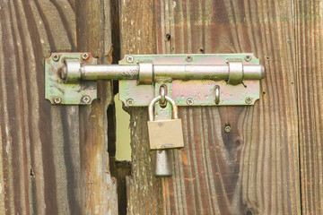 Wrought iron lock old wooden door