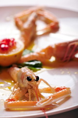 Shrimps/Prawns/Scampi, three raw langoustines