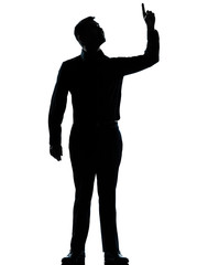 one business man poiting up happy silhouette