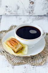 .A Cup of coffee with biscuits