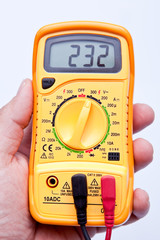 holding digital multimeter