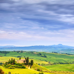 Tuscany, farmland and cypress trees. San Quirico Orcia, Italy.