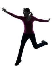 Fototapeta na wymiar woman happy running jumping silhouette