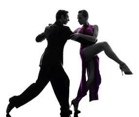 couple man woman ballroom dancers tangoing  silhouette