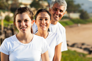 healthy family portrait at the beach