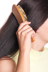 Woman with hairbrush