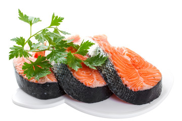 Slices of salmon, isolated on a white background.