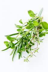 Herbs bouquet on white background