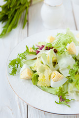 diet salad with boiled egg and lettuce