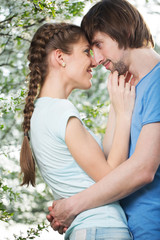 Young attractive couple together outdoors