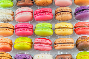 traditional french colorful macarons in a box