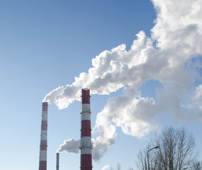 smoke rise industry factory chimneys heat blue sky