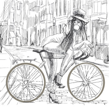 Girl resting on a bicycle and blowing bubble