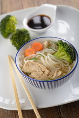 Chicken soup with rice noodles