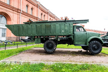 Vintage Russian military vehicle on green gras
