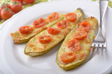 Baked zucchini with tomato