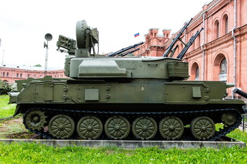 Fototapeta na wymiar Vintage Russian military vehicle on green gras