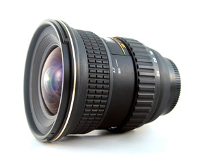 Ultra wide lens for SLR camera on white background