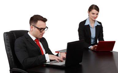 Young Business Couple on Laptops