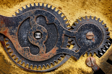 Fragment of old clock mechanism with gears