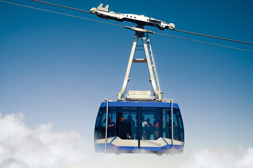 mountain lift (funicular) above the clouds