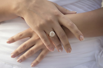 Obraz na płótnie Canvas Caucasian hands with wedding rings