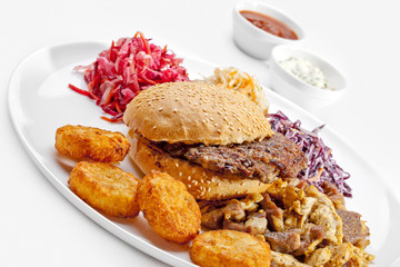 A Tasty food. Big hamburger, French fries . High quality image