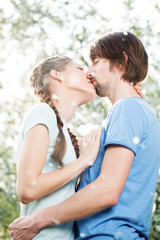 Young attractive couple together outdoors