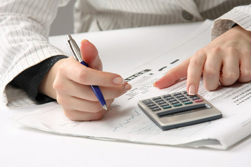 Business woman working with tax documents