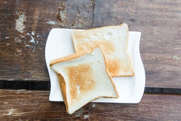 Two toast on a white plate